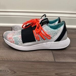 Under Armour Tennis shoes- Black and white with orange and blue accents